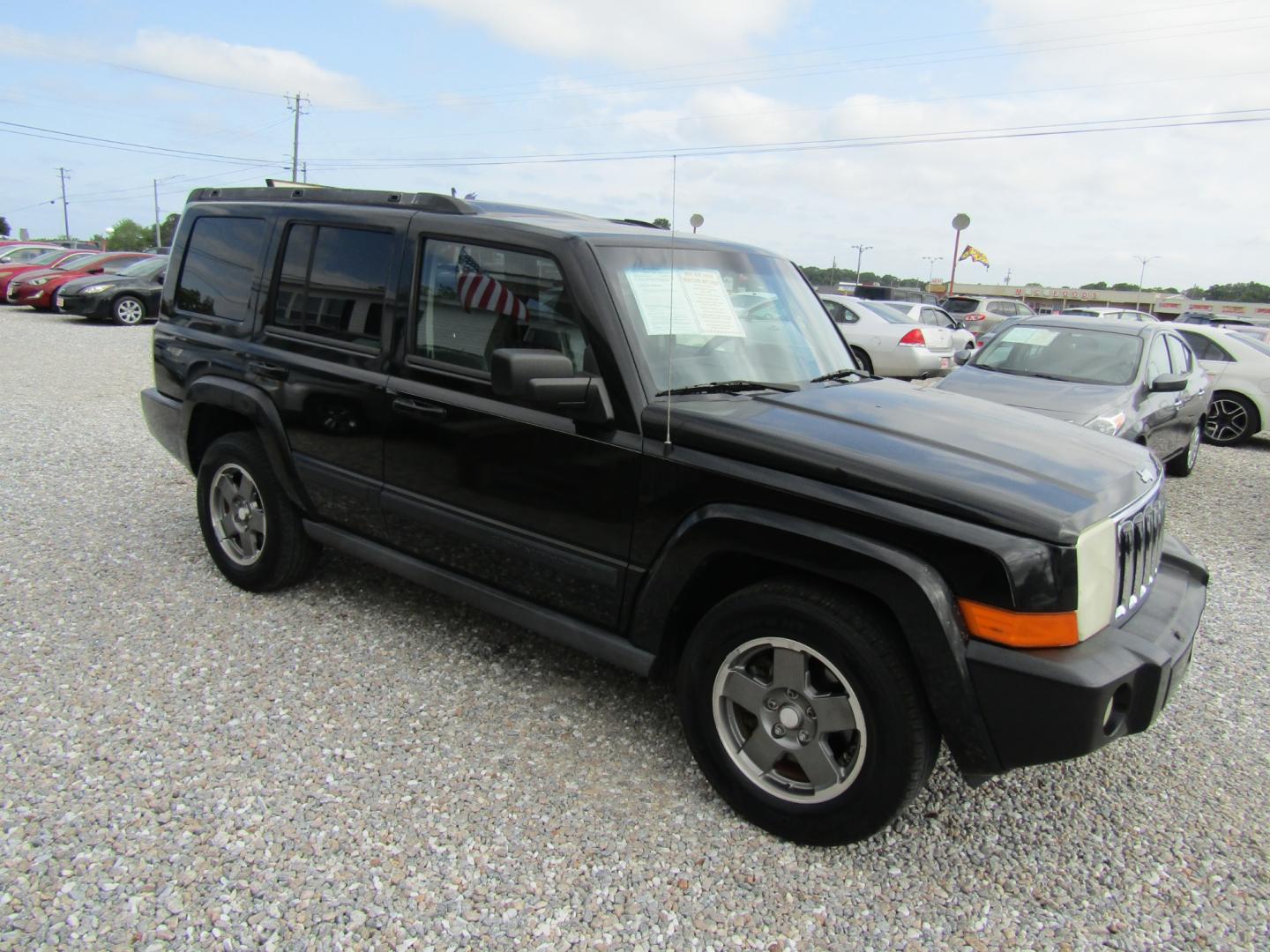 2007 Black /Gray Jeep Commander Sport 2WD (1J8HH48P37C) with an 4.7L V8 SOHC 16V FFV engine, Automatic transmission, located at 15016 S Hwy 231, Midland City, AL, 36350, (334) 983-3001, 31.306210, -85.495277 - Photo#0